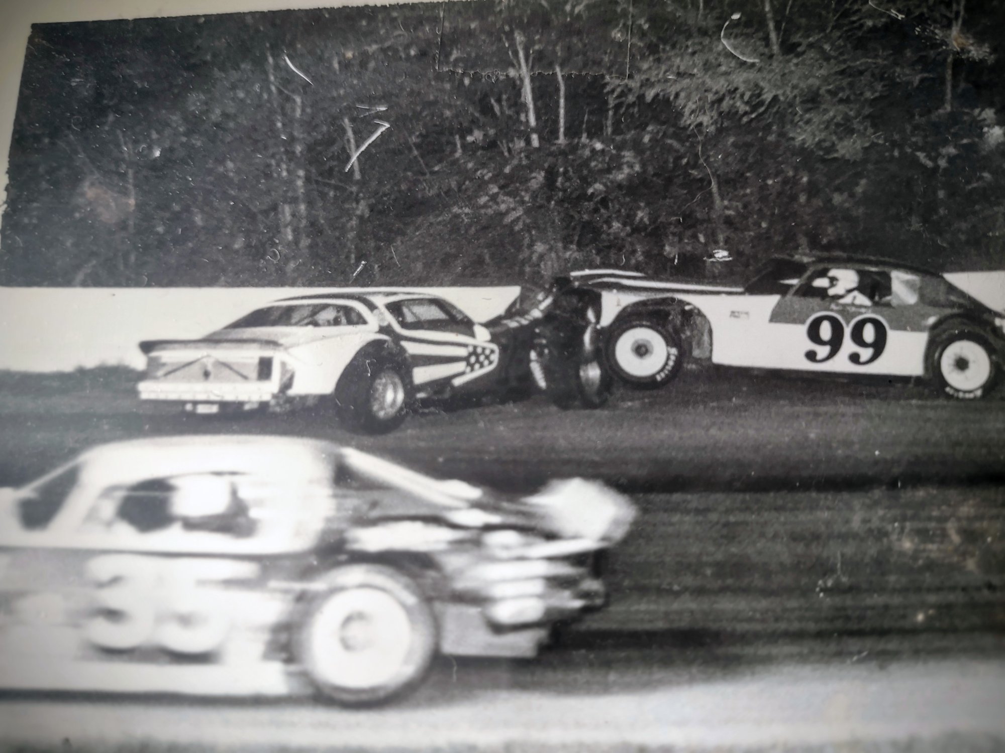While leading the Raymond Schere memorial race @ Shadybowl Don Gregory in our car broke a transmission and was hit by Bob Stansell while Buddy Shrock goes by on the inside